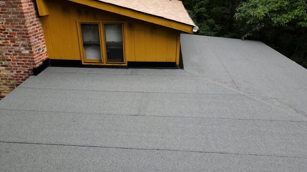 flat roof repair vs replacement service inspection by professional roofing contractor