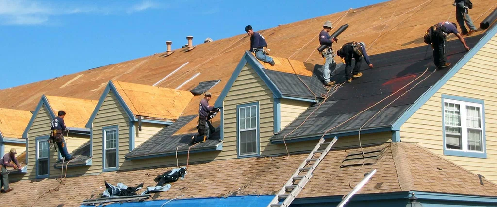 Roof Replacement Company Serving Staten Island NY 2 professional roof replacement company installing new roof on residential home