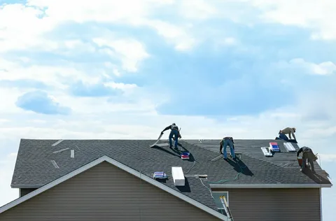 Roof Replacement Company Serving Staten Island NY 1 roof replacement company Staten Island NY removing old roof shingles safely