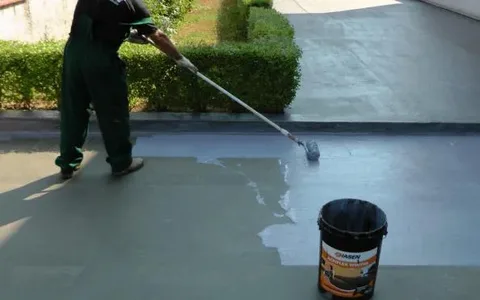 roof waterproofing membrane installation on flat rooftop